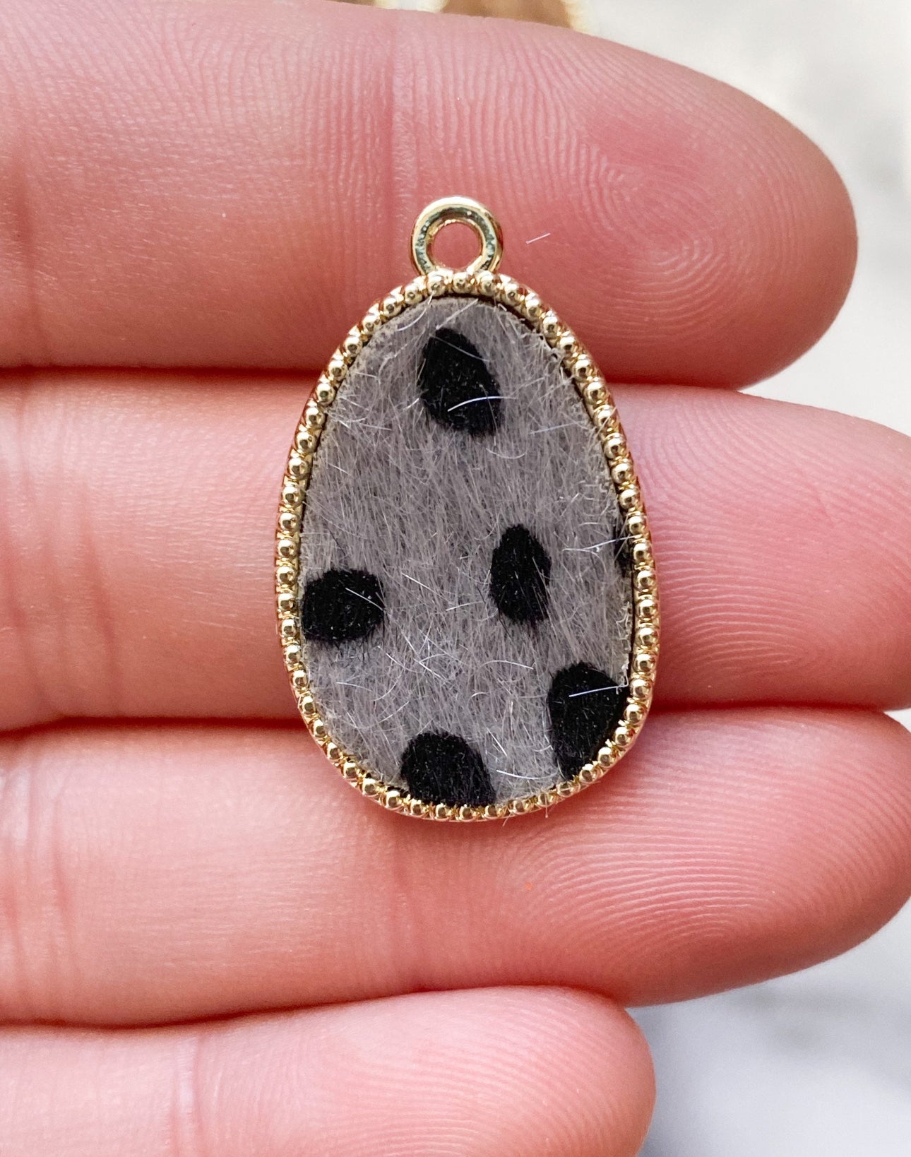 Animal print brass charm