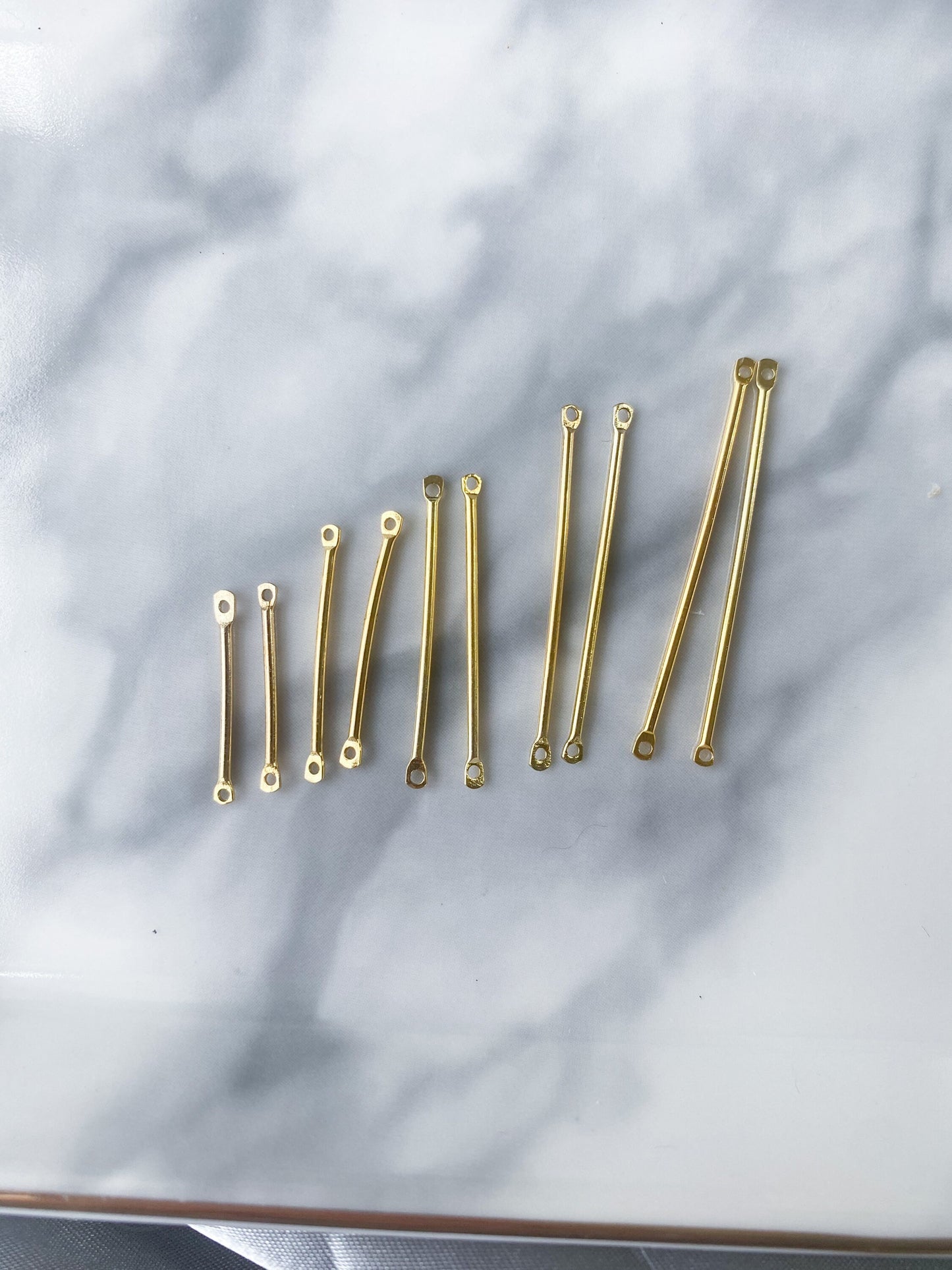 10 piece long double connector bar charm