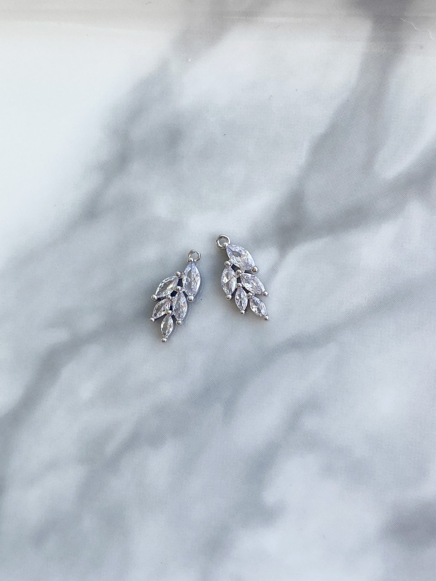 Silver plated small cubic zirconia leaf charm