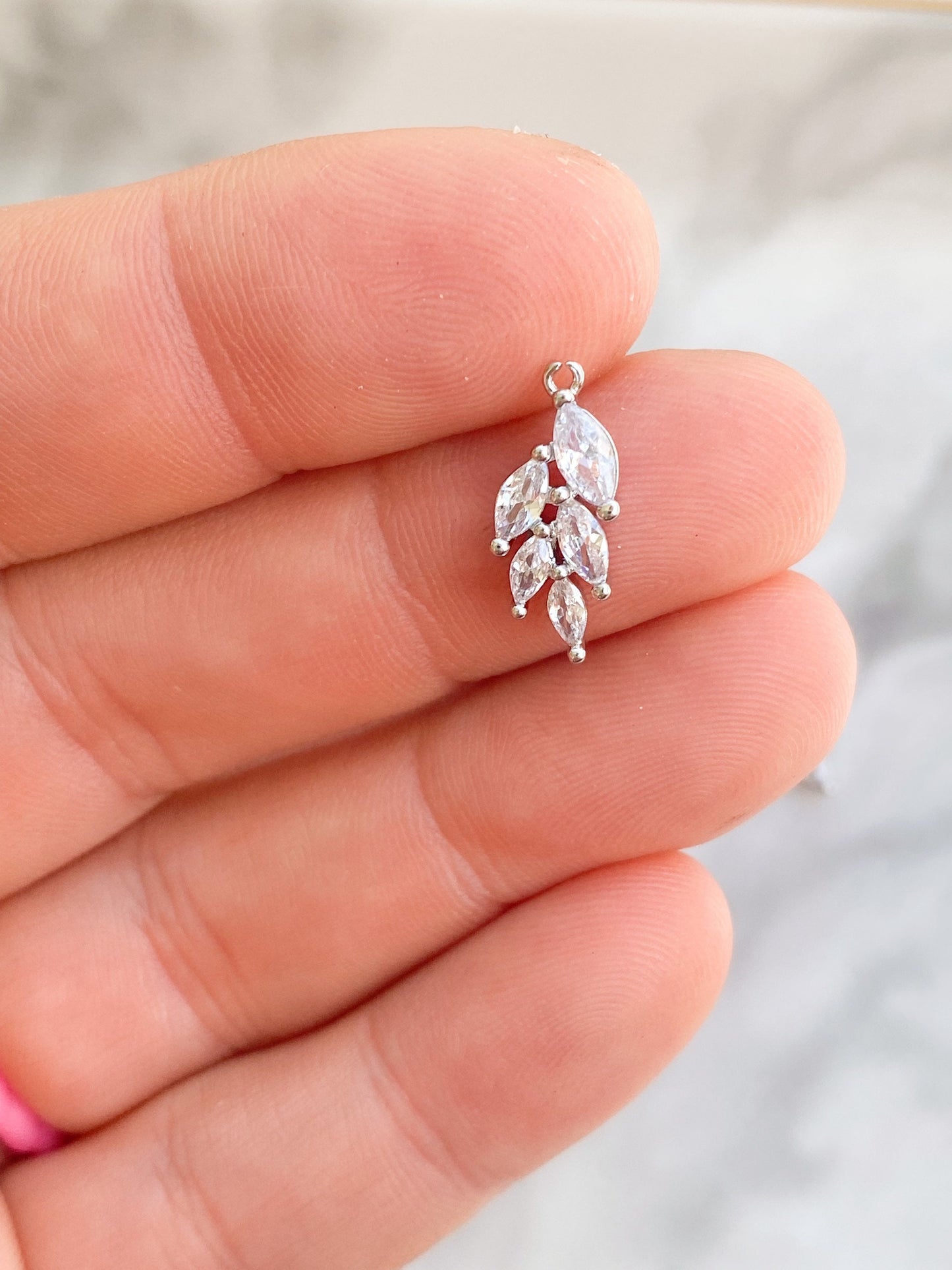 Silver plated small cubic zirconia leaf charm