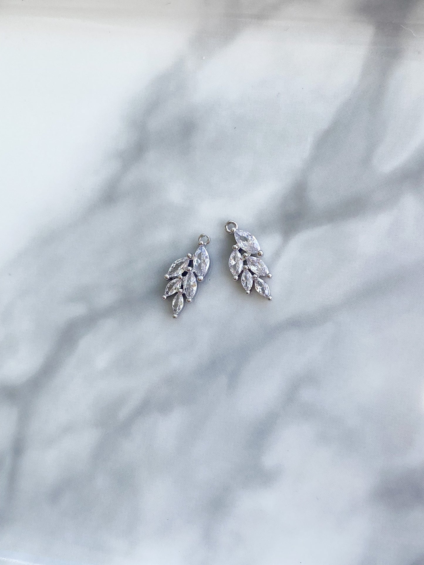 Silver plated small cubic zirconia leaf charm